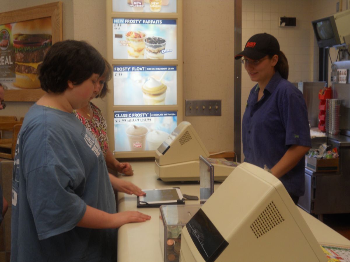 Student Marci Pickens places her very first order at Wendy's